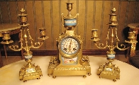 Clock with candlesticks