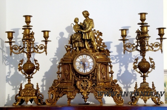 Fireplace clock with candle holders