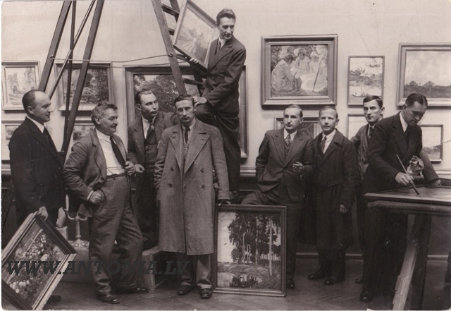 3 photos of the artists and 3 pages