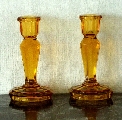 Amber glass candlesticks - a pair