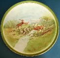 Plate. Deer at the mountain river